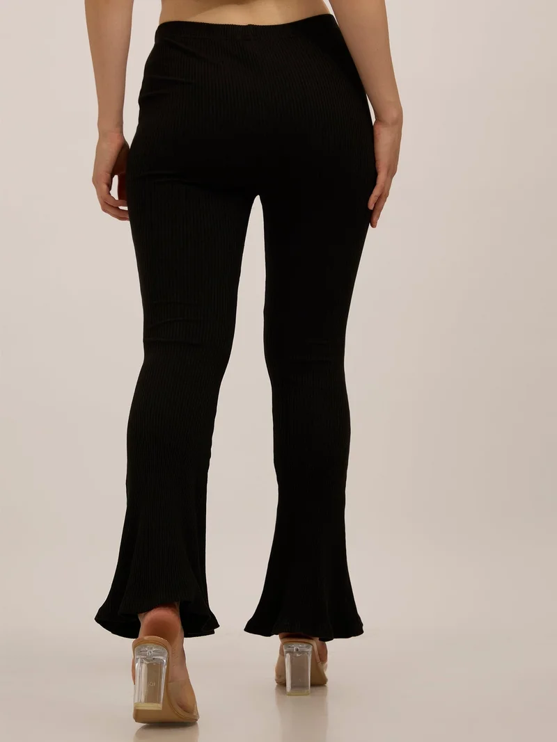 Outzidr black Black Ribbed Basic Flared Leggings for Women | Best Price UAE